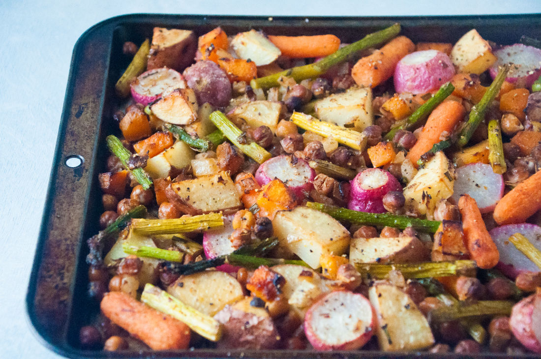 Spring vegetables on a sheet pan after roasting