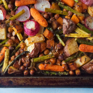 Spring vegetables on a sheet pan after roasting
